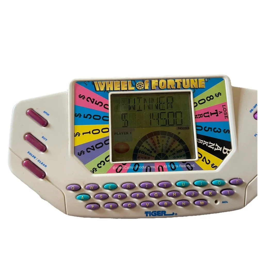 Vintage Tiger Electronics Wheel of Fortune Handheld Game Fun Family Working 1995